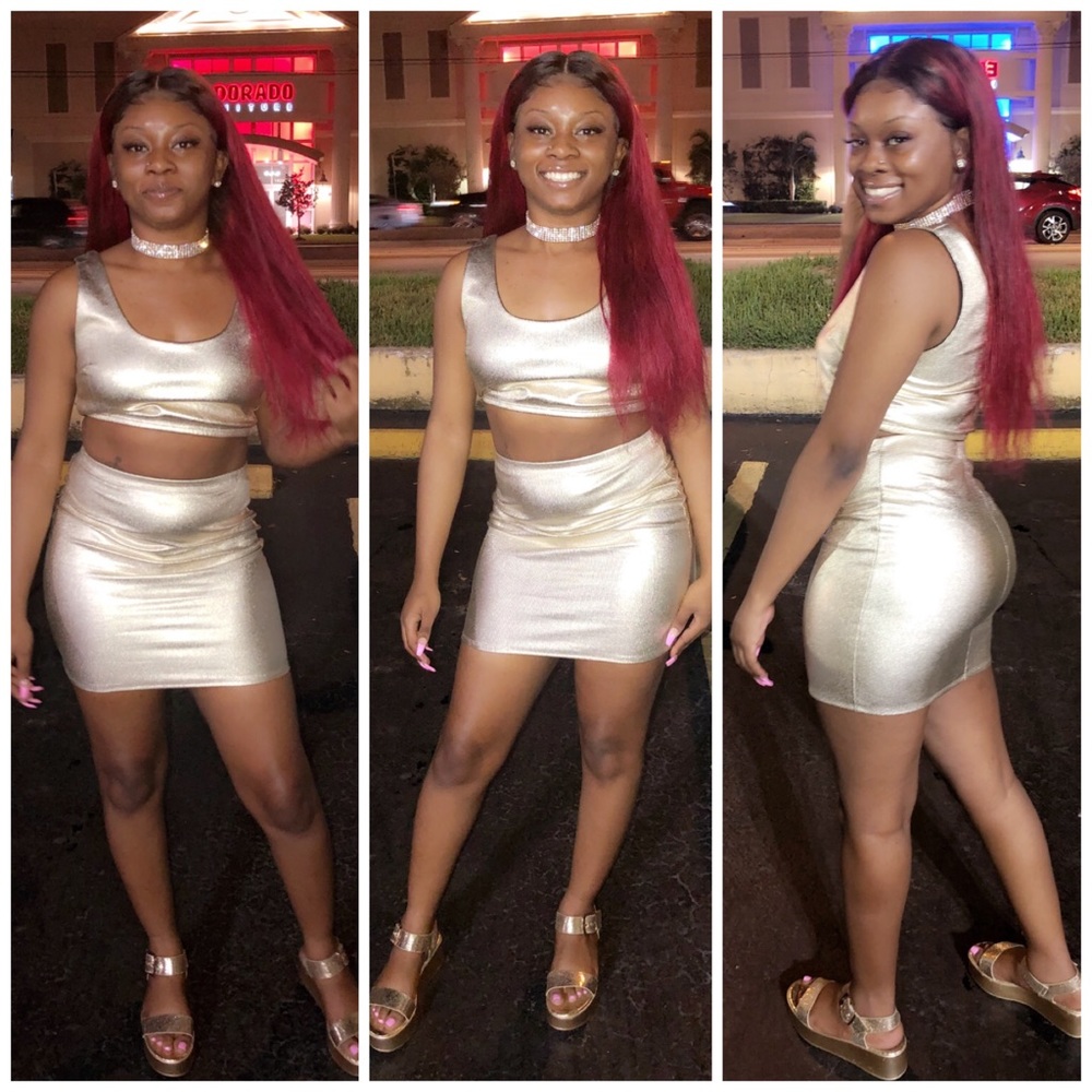 Gold Skirt Set, the skirt is a mini skirt and shirt is a crop top. (Worn once)